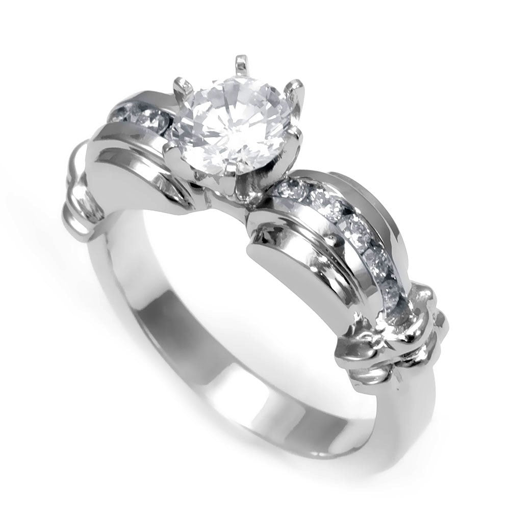 An Engagement Ring with channel set Round Diamonds in 18K White gold